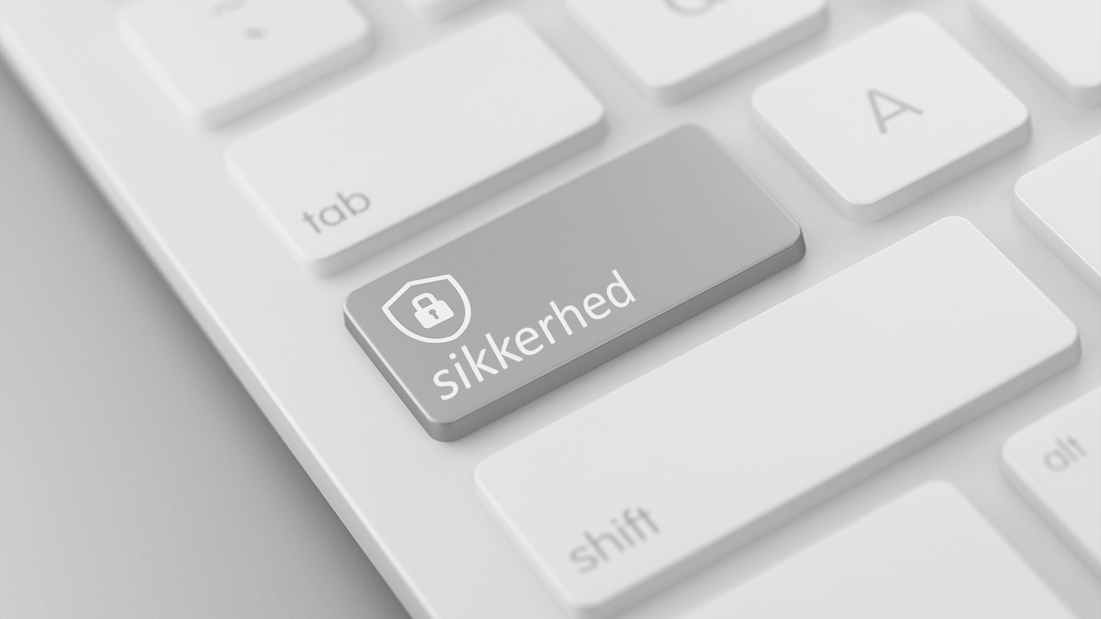 Et tastatur på en computer har en blå knap til online sikkerhed